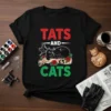 Tats and Cats t-shirt design featuring red text "TATS", "AND" in white, and green text "CATS" with a black cat