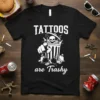 Black t-shirt with white text "Tattoos are Trashy" featuring a skull in a trash can design