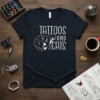 Tattoos and Cats t-shirt design with a black cat adorned with traditional tattoo imagery like anchors and hearts
