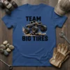 Team Big Tires text with a monster truck graphic splashing mud, on a blue t-shirt