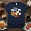 Navy t-shirt with "Team BREAKFAST" text and cartoon illustration of pancakes, fried eggs, bacon, and coffee