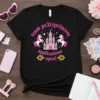 Black t-shirt with "team pr3typrincess applications open!" text, pink unicorns, and a glittery castle graphic
