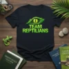 Team Reptilians t-shirt design featuring a green reptilian eye graphic with the text "TEAM REPTILIANS" below it