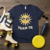 Navy t-shirt with a retro yellow sun wearing sunglasses and the text "TEAM TK" below it