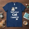 T-shirt with the text "tell your Cat i said hi" and a cartoon cat wearing headphones speaking into a microphone