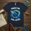 Navy t-shirt featuring a blue whale swimming in a circular water splash with the text "Thale On Phal Buten" above