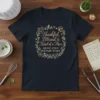 Thankful Blessed Kind of a Mess Dedicated Dietary Staff t-shirt with floral wreath and kitchen utensil graphics