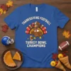 Blue t-shirt with "Thanksgiving Football Turkey Bowl Champions" text and a cartoon turkey wearing a football helmet