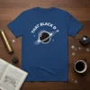 Blue t-shirt with white text "THAT BLACK D T" and a white planet graphic with rings, surrounded by stars