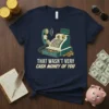 Cash register with coins and "That Wasn't Very Cash Money Of You" text on a navy t-shirt design