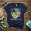 Retro graphic t-shirt with text "THAT WASN'T VERY CASH MONEY OF YOU" and a woman holding a piggy bank