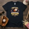Black t-shirt with "That's My Godson Out There!" baseball design featuring a flaming baseball and baseball diamond graphic