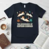 The Adventures of Captain Cuddles text with playful kittens and yarn balls on a navy t-shirt