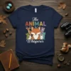 The Animal Whisperer t-shirt design with a fox, deer, bear, rabbit, and cat in a colorful woodland theme