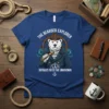 The Bearded Explorer Voyages Into The Unknown text on a blue t-shirt with a polar bear captain graphic and nautical