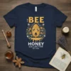 The Bee Honey Collective t-shirt design with a beehive, bees, and floral elements