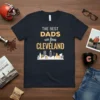 T-shirt with text "THE BEST DADS are from CLEVELAND" and a Cleveland skyline graphic