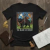The Black Cat Knight t-shirt design showing a black cat with a knight riding it through a forest, text below