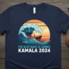 The Blue Wave Is Coming Kamala 2024 political t-shirt design with black cats surfing a blue wave at sunset
