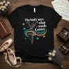 Black t-shirt with white text "The body says what words Cannot" above a colorful graphic of a ballet dancer in