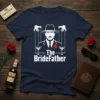 The BrideFather t-shirt design featuring a stylized man in a fedora, puppet strings, martinis, and the text "The BrideFather"