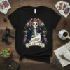 The Cat Lady t-shirt design with a skeleton holding a cat, surrounded by celestial elements and flowers