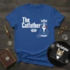 The Catfather t-shirt design featuring a stylized cat wearing a fedora and rose, with paw prints