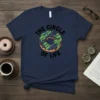The Circle Of Life text above a donut graphic designed to look like the Earth, printed on a navy blue