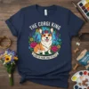 The Corgi King Lord of Paws and Petals t-shirt featuring a corgi with a flower crown and floral border