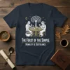 The Feast of the Simple Humility & Sustseance t-shirt featuring medieval-style illustration of people dining