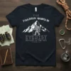 The Forbidden Mountain Everest Beware of the Yeti T-Shirt featuring Bigfoot climbing a snowy peak under stars