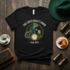 The Gentleman's Hour Estd. 1873 t-shirt with a green chameleon in a suit and a frog holding teacups, vintage clock