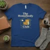 The Homebody Club t-shirt design featuring a stylized house with an armchair, lamp, and blanket inside