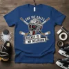 The Ice Calls Hockey Is My Religion t-shirt featuring a goalie mask and crossed hockey sticks