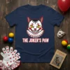 The Joker's Paw T-Shirt featuring a creepy cat clown face with ruffled collar and bold text
