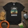 The Lawn Ranger t-shirt design featuring a person riding a lawnmower with a vintage sunset background and text "The Lawn
