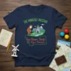 Navy blue t-shirt featuring a cartoon golfer, castle, and the text "The Minigolf Mastah! St. Regis Montana"