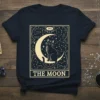The Moon tarot card design featuring a black cat sitting on a crescent moon against a starry night sky, with