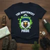 The Northwest Pride t-shirt featuring a fierce eagle head wearing a beanie, with green paint splatter