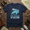 The Ocean Is Calling T-Shirt featuring a blue sea turtle swimming with mountains and sun graphic