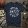 The Older I Get The Better I Was quote on a navy t-shirt with graphics of runners, hurdles, basketball, and