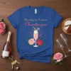 The only pain I want is Champagne text on a blue t-shirt with a champagne glass and roses graphic