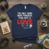Navy t-shirt with text "The Only Thing More Powerful Than Hate Is Love" and gamer controller icons within a heart