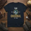 The Original Est 1990 t-shirt with a vintage compass graphic and mountains, celebrating birth year 1990