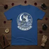 The Owl Of The Roses t-shirt design with a detailed owl, crescent moon, and rose graphics