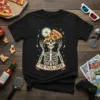 Black t-shirt with "The Pizza Lover" text and a skeleton holding a slice of pizza, with celestial elements
