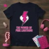 The Power of Pink Lightning quote t-shirt with a pink lightning bolt inside a white heart graphic