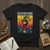 Black t-shirt design featuring the text THE RHYTHM OF NATURE MELODY OF THE ANCIENTS, a silhouette of a person playing
