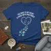 T-shirt with "The Road To My Heart Is Paved With Paw Prints" text and a cat silhouette within a heart