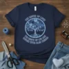 Navy blue t-shirt with circular design of a tree with blue heart leaves and the text "The Roots of Love
